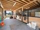 Inside a stall featuring a horse, an open ceiling, and gated stall designs at 12160 Spring Creek Rd, Parker, CO 80138