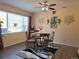 Cozy dining area features a dark wood table, decorative lighting, and attractive decor at 13626 Garfield St # A, Thornton, CO 80602