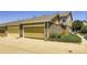 Attached one car garage with stone facade and neutral color door at 13626 Garfield St # A, Thornton, CO 80602