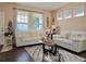 Inviting living room featuring comfortable white couches, stylish decor, and plenty of natural light at 13626 Garfield St # A, Thornton, CO 80602