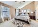 Serene main bedroom with vaulted ceilings, natural light, and plush carpeting at 13626 Garfield St # A, Thornton, CO 80602