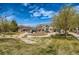 Community playground featuring play structures, swings, picnic tables, green space, and beautiful landscaping at 13626 Garfield St # A, Thornton, CO 80602