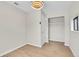 Bright bedroom featuring wood-look floors, neutral walls, recessed lighting, and a closet at 1448 Newport St, Denver, CO 80220