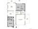 Detailed first-floor plan highlighting a spacious layout with an open kitchen, living room, and two-car garage at 2656 Sawyer Ln, Erie, CO 80026