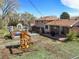 Aerial view of the backyard featuring a play set, spacious deck, and a well-maintained lawn, perfect for outdoor enjoyment at 2009 S Zephyr Ct, Lakewood, CO 80227
