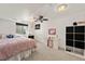 Finished basement bedroom with neutral carpet, a ceiling fan, and a vanity area at 2009 S Zephyr Ct, Lakewood, CO 80227