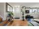 Bright entryway with hardwood floors, a decorative mirror, and plenty of space for plants and decor at 2009 S Zephyr Ct, Lakewood, CO 80227