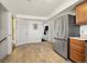 This kitchen features wood cabinets, tile flooring and stainless steel appliances at 2009 S Zephyr Ct, Lakewood, CO 80227