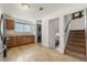 An open kitchen featuring wood cabinets, stainless steel appliances and a convenient washer and dryer at 2009 S Zephyr Ct, Lakewood, CO 80227