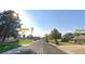 Residential street view showing a school and houses nearby at 4981 E Cornell Ave, Denver, CO 80222