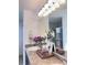 Bathroom vanity featuring decor and an extra large mirror at 26032 E Geddes Cir, Aurora, CO 80016