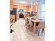 Eat-in kitchen showcasing wood cabinets and stainless steel appliances at 26032 E Geddes Cir, Aurora, CO 80016