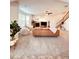 Spacious living room with modern furniture, fireplace, and large windows at 26032 E Geddes Cir, Aurora, CO 80016