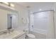A bright bathroom features a bathtub with white subway tile and a modern sink and faucet at 3500 S Corona St # 407, Englewood, CO 80113