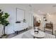 Airy living room with contemporary decor and open flow to the modern kitchen at 3500 S Corona St # 407, Englewood, CO 80113