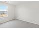 This bedroom has a window with a view of the houses nearby at 1937 S Coolidge Way, Aurora, CO 80018