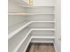 Walk-in pantry features custom shelving for maximum storage at 1937 S Coolidge Way, Aurora, CO 80018