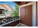 Cozy balcony with wood accents offers a charming outdoor space with a convenient storage closet at 7090 Simms St # 202, Arvada, CO 80004