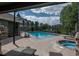 Inviting pool area featuring a hot tub and seating, perfect for relaxation and community enjoyment at 7090 Simms St # 202, Arvada, CO 80004