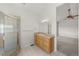 Main bathroom featuring shower and vanity at 12747 Bestview Dr, Larkspur, CO 80118