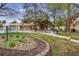 Pool area and grassy area with barbeque pits, picnic tables, and a rock garden at 7395 E Quincy Ave # 206, Denver, CO 80237