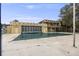 Community pool with a retractable roof and access to the clubhouse at 7395 E Quincy Ave # 206, Denver, CO 80237