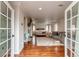 Bright, spacious Primary bedroom featuring a fireplace, desk, and hardwood floors at 600 Vine St, Denver, CO 80206