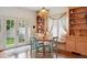 Cozy breakfast nook with a round table, built-in seating, and natural light at 600 Vine St, Denver, CO 80206