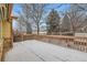 Wooden deck with railing overlooks the private backyard at 2308 Dogwood Dr, Erie, CO 80516