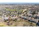 The aerial view reveals the community layout including neighborhood golf course at 1863 Rose Petal Ct, Castle Rock, CO 80109