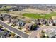 An aerial view showcases this neighborhood's proximity to the local golf course at 1863 Rose Petal Ct, Castle Rock, CO 80109