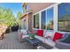 Comfortable seating on the back deck creates an inviting outdoor living space at 1863 Rose Petal Ct, Castle Rock, CO 80109