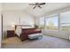 Spacious bedroom with large window, vaulted ceilings, neutral carpet, and stylish furnishings at 1863 Rose Petal Ct, Castle Rock, CO 80109