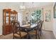 Formal dining room with elegant chandelier, hutch, and dining set for six at 1863 Rose Petal Ct, Castle Rock, CO 80109