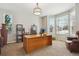 Bright office space featuring ample natural light and a cozy chair at 1863 Rose Petal Ct, Castle Rock, CO 80109