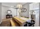 Open concept dining room with kitchen view and modern decor at 9914 Truckee St, Commerce City, CO 80022