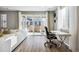 Home office space with sliding glass doors leading to the backyard at 9914 Truckee St, Commerce City, CO 80022