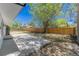 Fenced backyard with a concrete patio providing an ideal space for relaxation at 1486 S Kingston St, Aurora, CO 80012