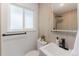 Contemporary bathroom with sleek vanity, LED mirror, updated shower and modern fixtures at 1486 S Kingston St, Aurora, CO 80012