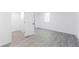 Clean bedroom with white walls and gray wood floors at 1486 S Kingston St, Aurora, CO 80012