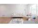 Inviting living room featuring modern decor, hardwood floors, and cozy seating arrangement at 1486 S Kingston St, Aurora, CO 80012