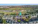 Aerial view of the townhome next to a park, garden and pond at 2154 Concord Ln, Superior, CO 80027