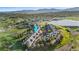 Aerial view of the beautiful townhome next to a lake and mountains at 2154 Concord Ln, Superior, CO 80027