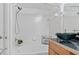 Bright bathroom featuring a shower-tub combo, sink, and vanity at 2154 Concord Ln, Superior, CO 80027