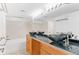 Modern bathroom featuring dual vessel sinks on a black granite countertop and a tub at 2154 Concord Ln, Superior, CO 80027