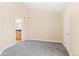 Spacious bedroom featuring neutral walls, plush carpeting, and an ensuite bathroom at 2154 Concord Ln, Superior, CO 80027