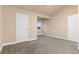 Spacious carpeted bedroom with white trim, two closets, and a window niche at 2154 Concord Ln, Superior, CO 80027