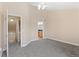 Cozy bedroom featuring neutral walls, plush carpeting and a ceiling fan at 2154 Concord Ln, Superior, CO 80027