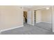 Bright bedroom featuring neutral walls, carpeting, and a mirrored closet door at 2154 Concord Ln, Superior, CO 80027