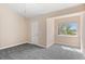 Bright bedroom with a large window and neutral walls, creating a serene atmosphere at 2154 Concord Ln, Superior, CO 80027